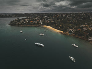 Chinamans Beach at Sydney - Boats and stormy weather - Stock photo