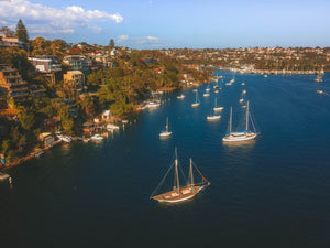 Luxury properties and sailboats at Seaforth Bluff in Sydney, NSW, Australia
