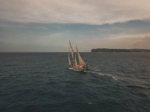 Old boat sailing away - free stock image